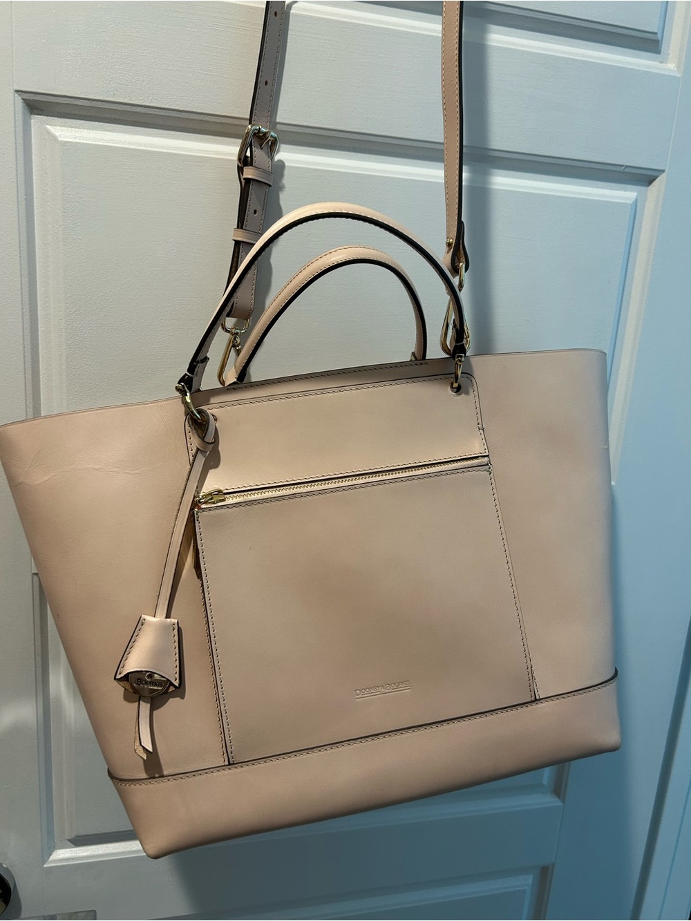 Authentic Dooney and Bourke Leather Tote with handles and a crossbody strap